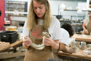person in ceramic class